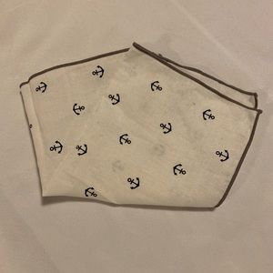 White pocket square with blue anchors